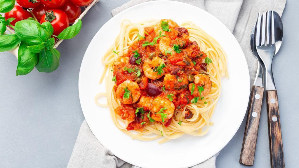 Linguine Puttanesca · Fresh linguine with shrimp, olives, onions, and capers in our marinara sauce.