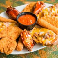 The Sampler · hot wings, mozzarella sticks, chicken fingers, potato boats, served with dipping sauces.