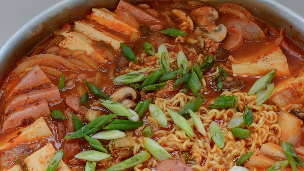 Army Stew · Spicy kimchi stew with pork, sausage, and ramen noodles.