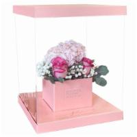 Floral Beauty · An arrangement of floral bouquet in beautiful clear box for your recipient to see.
