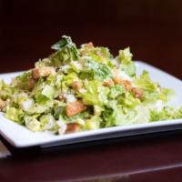 Caesar Salad · Romaine, Croutons, Parmesan and Caesar Dressing.