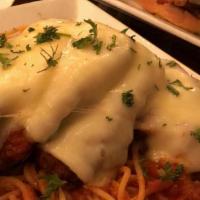 Chicken Parmigiana · Served with Spaghetti and Homemade Tomato Sauce.