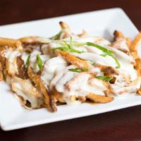 Disco Fries · Served with Brown Gravy and Mozzarella Cheese.
