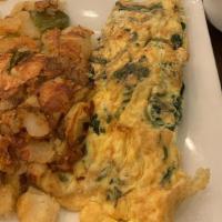 Florentine Omelette · Feta and Spinach.
Served w/ Homefries & Toast