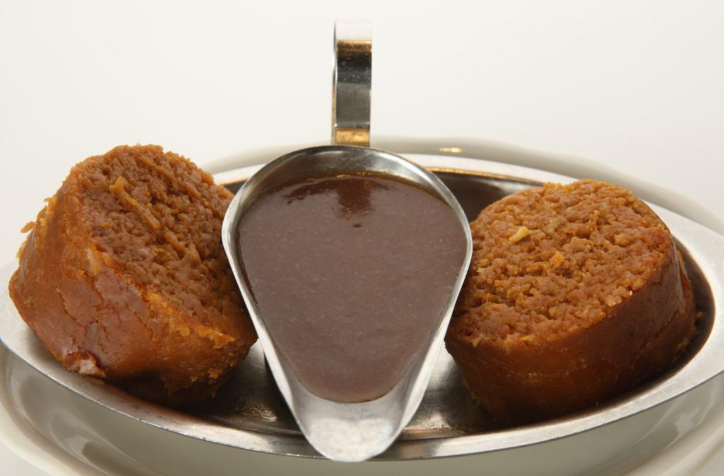Stuffed Derma (Kishke)
 · Casing stuffed with matzoh meal, schmaltz, spices and beef. Served with gravy.