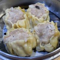 Pack Of Frozen Pork Siu Mai 豬肉燒賣  (10 Count Per Pack) · Minced pork, mushrooms, and shrimp wrapped in wonton wrappers.