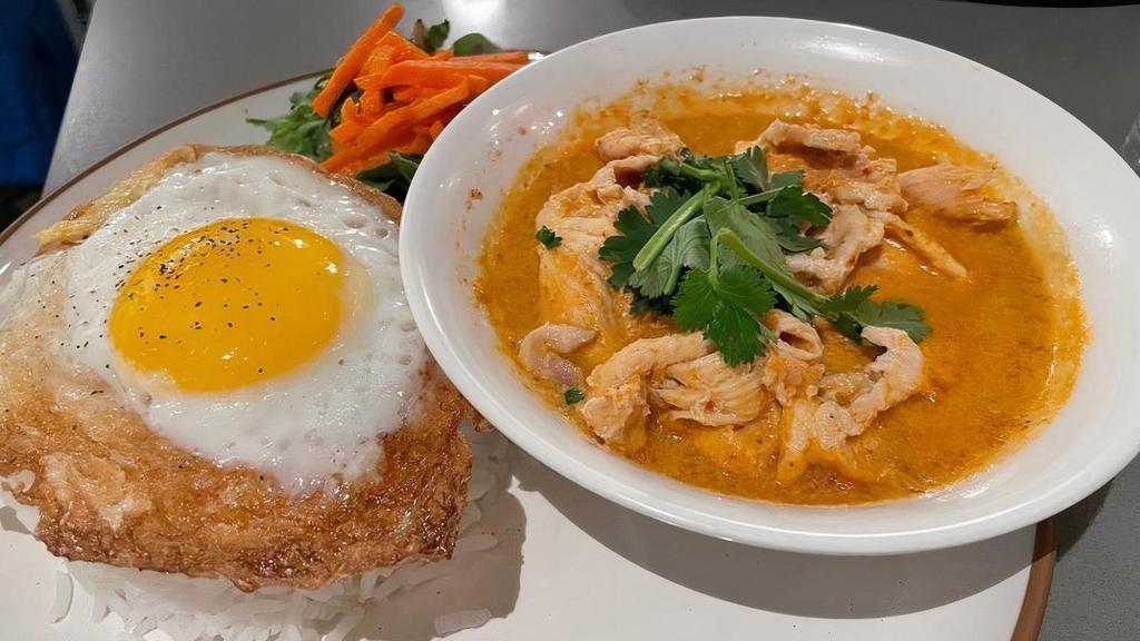 Panang Curry Rice · White meat chicken breast slowed cooked in creamy. coconut milk and spicy Panang curry paste served. with jasmine rice and sunny side up egg. Gluten-free