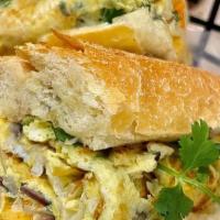 Banh Mi: Onion Omeltte · Omelette with onion, shallots and scallions Vietnamese sandwich on toasted French baguette w...