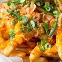 Kimchi Fries*Vg (Serve 5) · French fries, spicy mayo, scallions, topped with spicy pickled cabbage