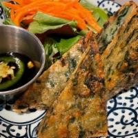 Chive Pancake*Vg (12 Pcs) · fried vegetarian chive pancakes served with soy. vinaigrette dipping sauce.