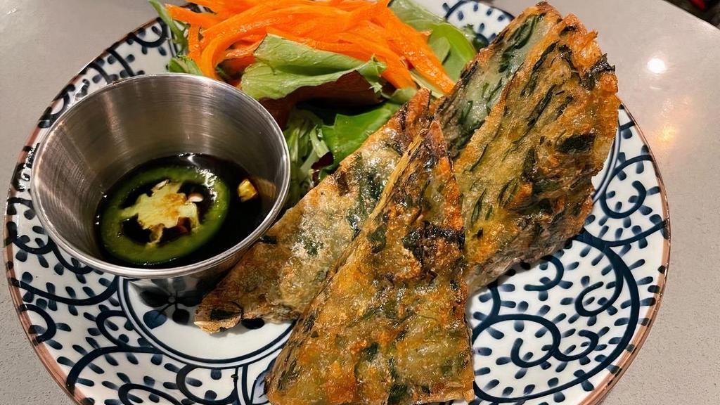 Chive Pancake*Vg (12 Pcs) · fried vegetarian chive pancakes served with soy. vinaigrette dipping sauce.