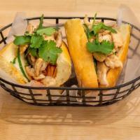 Banh Mi Chicken (Serve 5) · Vietnamese sandwich on a toasted French baguette with pickled carrot, cucumber, cilantro, an...