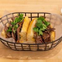 Banh Mi Beef (Serve 5) · Vietnamese sandwich on a toasted French baguette with pickled carrot, cucumber, cilantro, an...