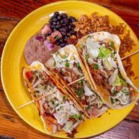 Lunch La Casa Tacos · Two tacos and a side salad. Choice of chicken, pork, brisket, ground beef or veggies.  Chees...