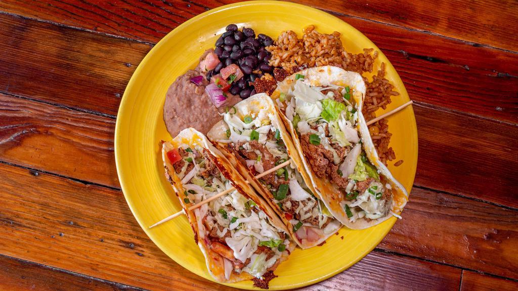 Lunch La Casa Tacos · Two tacos and a side salad. Choice of chicken, pork, brisket, ground beef or veggies.  Cheese, lettuce cabbage medley, pico De gallo, and chipotle cream on the tacos.