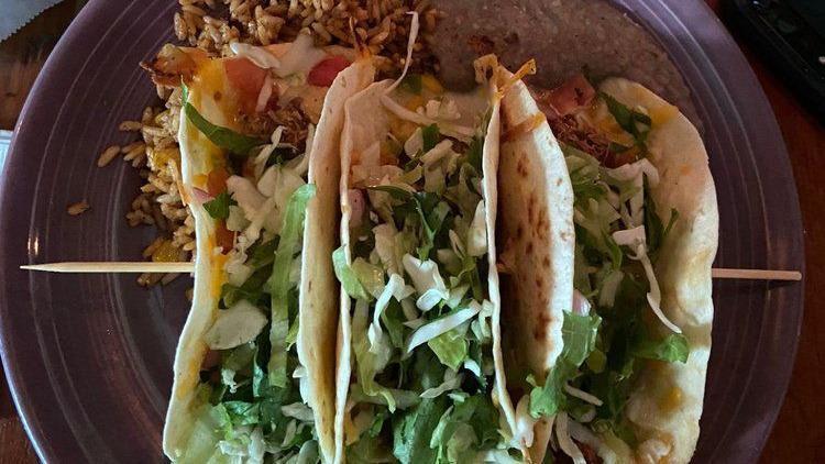 Classic A La Carte Taco · Choice of one of our chicken, pork, brisket, ground beef, veggie, or fish taco. Lettuce, cheese, chipotle cream, and pico on taco.