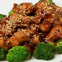 Sesame Chicken · gà me
crispy pieces of chicken tossed in a sweet and sour glaze, garnished with sesame seed ...