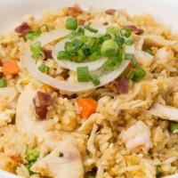 House Special Fried Rice · fried rice, peas, carrots, eggs, chicken, shrimp and Vietnamese sausage
