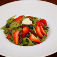 Mantra Salad · Arugula tossed with poached beets, berries, whipped ricotta, and pistachios served with our ...
