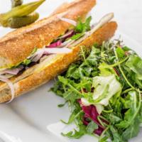 Grilled Trout Po' Boy Sandwich · Remoulade, pickled red cabbage and fennel slaw.