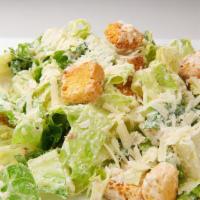 Caesar Salad · The classic with homemade dressing, garlicky croutons & freshly grated Parmesan.