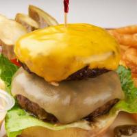 Juicy Lucy · Two of our famous patties stuffed with cheese. Served with an order of fries