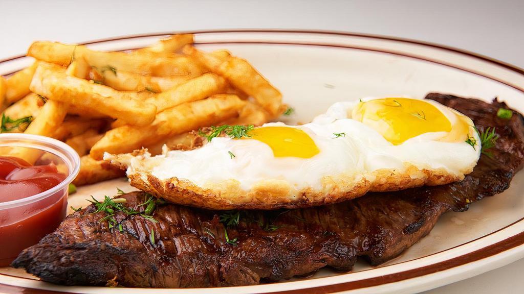 Steak & Eggs · Prime skirt steak topped with 2 eggs cooked any way you request! Served with french fries.