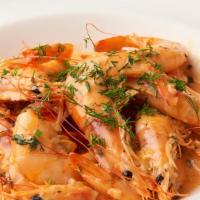 Shrimp Sautéed · 20 piece head-on shrimp in garlic white wine sauce.