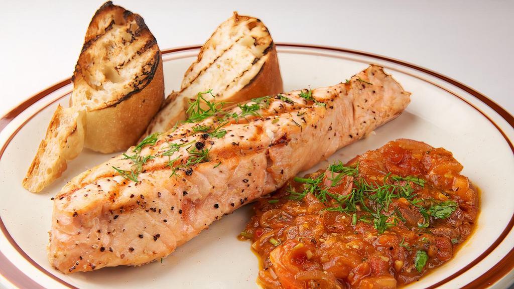 Salmon Sautéed · Fresh tomatoes, garlic, and imported capers.