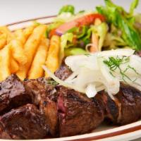 Beef Kebabs Platter · Two Beef kebabs cooked to your preferred temperature served with salad and fries or rice pil...