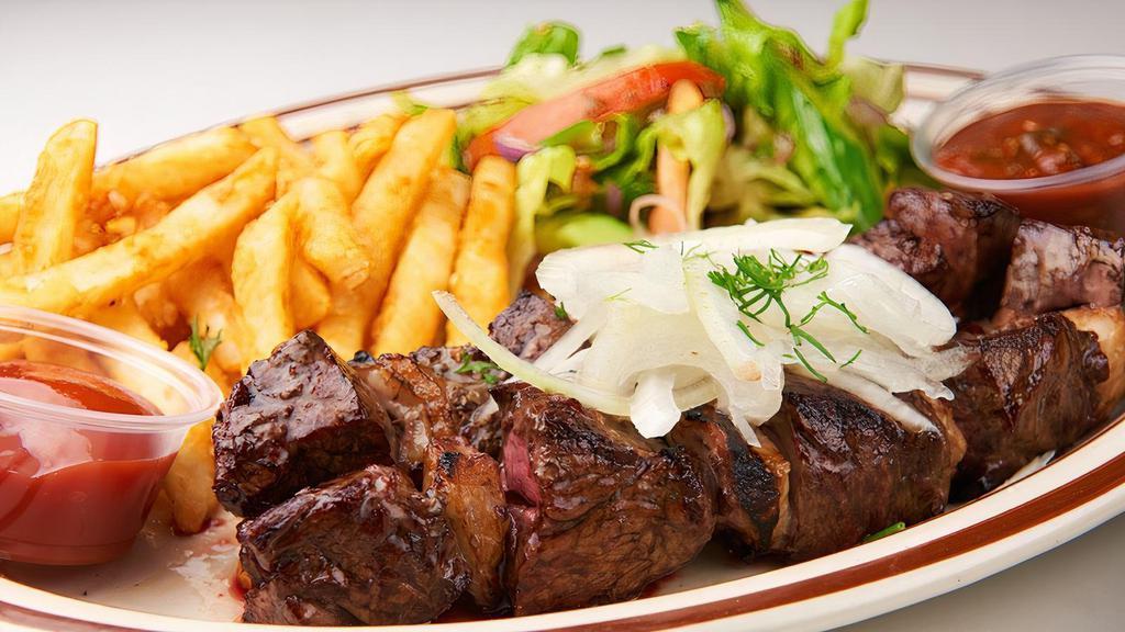 Beef Kebabs Platter · Two Beef kebabs cooked to your preferred temperature served with salad and fries or rice pilaf.