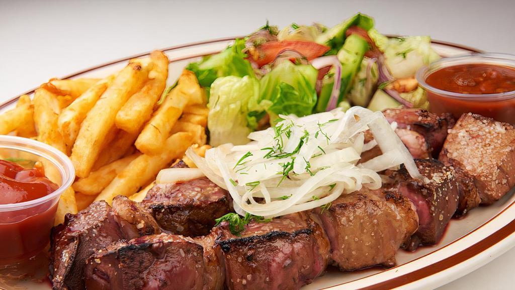 Liver Kebabs Platter · Two Liver kebabs cooked to your preferred temperature served with salad and fries or rice pilaf.