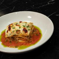 Lasagna Bolognese · Traditional meat lasagna.