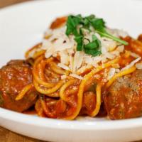 Spaghetti Polpette · Homemade veal meatballs in tomato sauce.