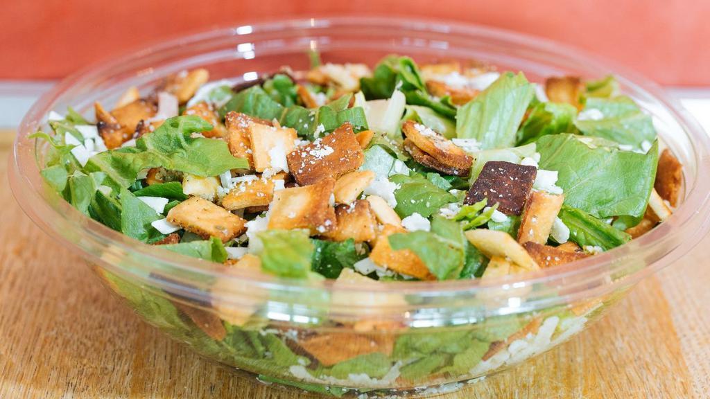 Caesar Salad · Organic romaine, parmesan, and croutons.