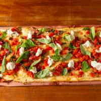 Bruschetta Pie  · Bruschetta: mozzarella, chopped tomatoes, onions, garlic, parmesan, olive oil, basil, parsle...