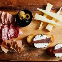 Charcuterie Board · Goat Cheese & Membrillo Crostinis, Prosciutto di Parma, Mortadella, Soppressata, Manchego, M...