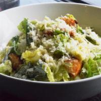 Caesar Salad · Hearts of Romaine, Herbed Brioche Croutons, Aged Grana Padano Cheese, Caesar Dressing