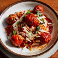 Linguini & Meatballs · Tomato Basil Sauce, Topped with Shaved Parmesan