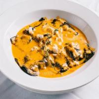 Seafood Ravioli · Thyme Lobster Bisque Cream Sauce