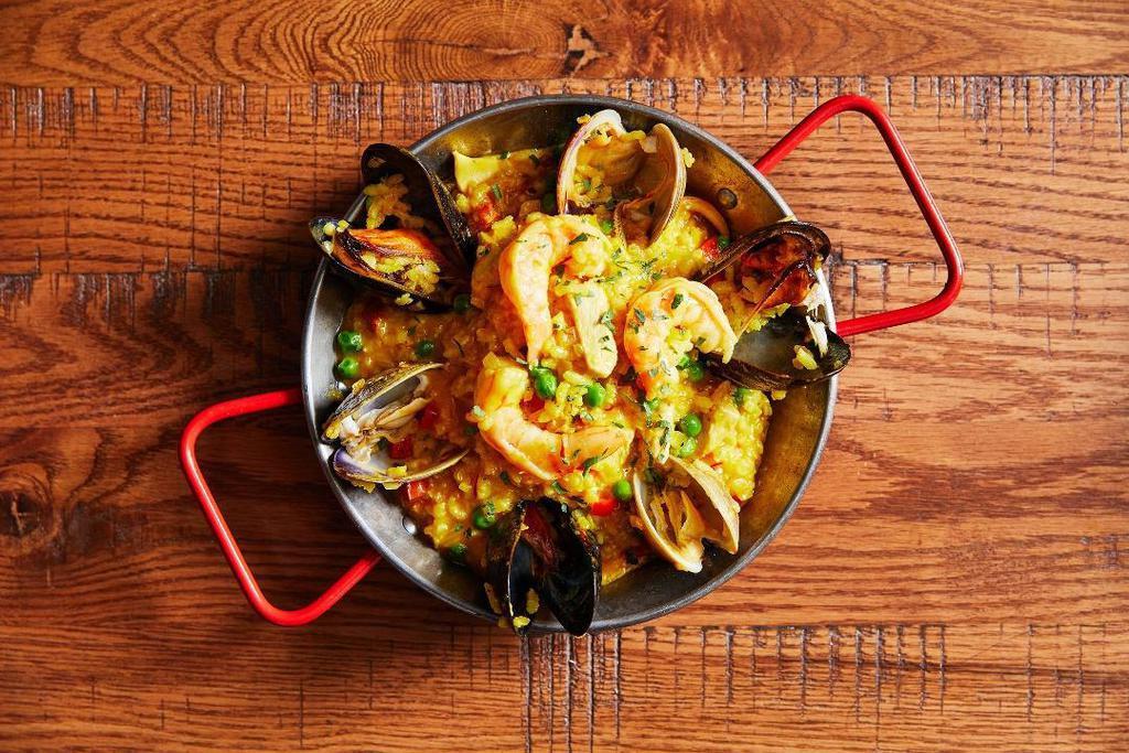 Valencian Risotto · Shrimp, Calamari, Clams, Mussels, Chorizo, Chicken, Red Pepper, Peas, Spanish Saffron