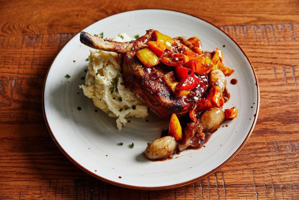 Grilled Pork Chop · Red Wine & Balsamic Braised Cipollini Onions & Tricolor Peppers, Chive Mashed Potatoes