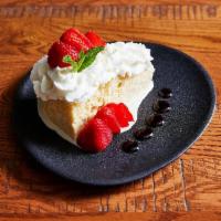 Tres Leches Cake · Topped with Homemade Whipped Cream & Strawberry