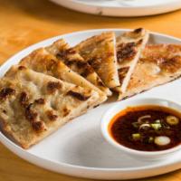 Scallion Pancake · Sweet soy and chili.  Pancakes are vegan, vegetarian. 
 Sauce contains oyster sauce.