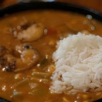 Creole Gumbo · Creole shrimp, chicken andouille, seasonal vegetables, and spicy seafood broth.