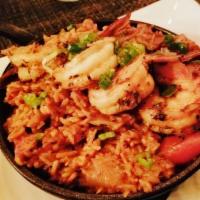 Jambalaya · Seared shrimp, andouille chicken, chicken breast, and dirty rice.