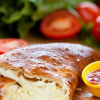 Cheese Calzone · Ricotta and mozzarella cheese. served with side of marinara sauce