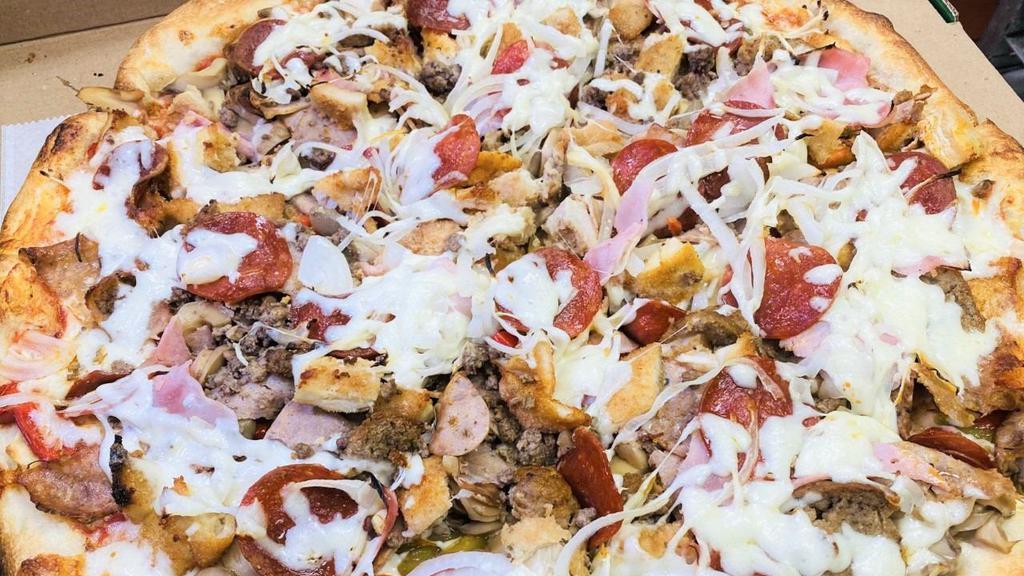 Suprema Pizza · Chicken, pepperoni, sausage, meatballs, ham, pepper, onion, and mushrooms.