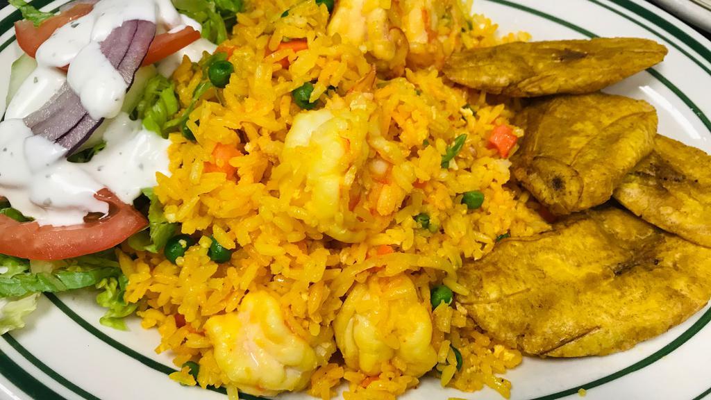 Arroz Con Camarones · Shrimp with rice and fried plantains.
