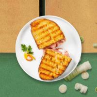 The Fowl Panini · Sliced turkey, melted cheese, and tomato on your choice of toasted bread.